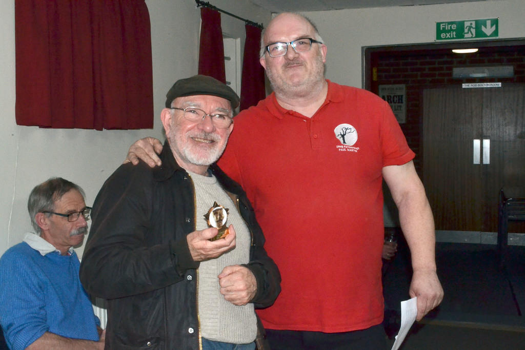 Eric recieving his trophy