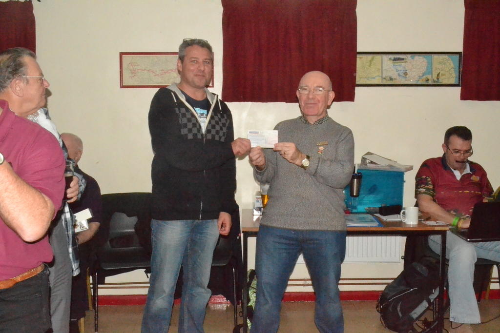 Eric Presenting Alan P with the cheque for Jane Sleight's charity jump.