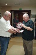 Bruce presenting the trophy to Jim